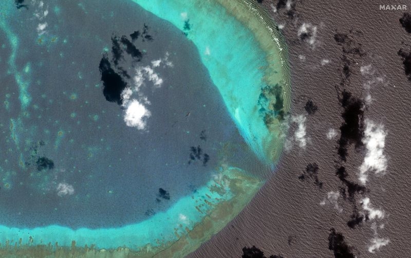 Philippines, China accuse each other of dangerous moves in disputed South China Sea shoal