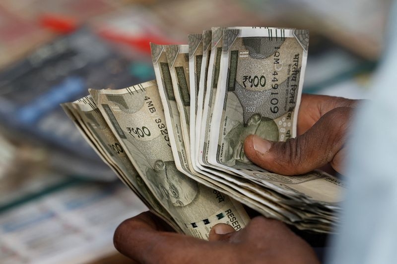 US court ruling on tariffs lifts dollar, dragging rupee lower