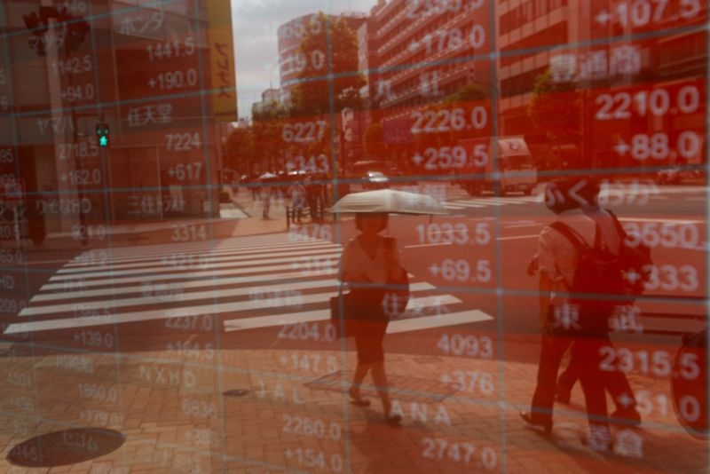 Asian stocks rise, dollar wobbles as trade uncertainty persists