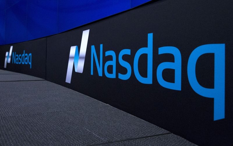 Nasdaq hits record high, on track for a new bull market
