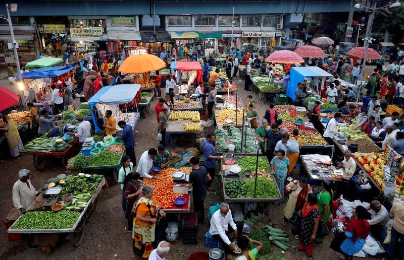 India's retail inflation slumps to more than six-year low as food prices fall