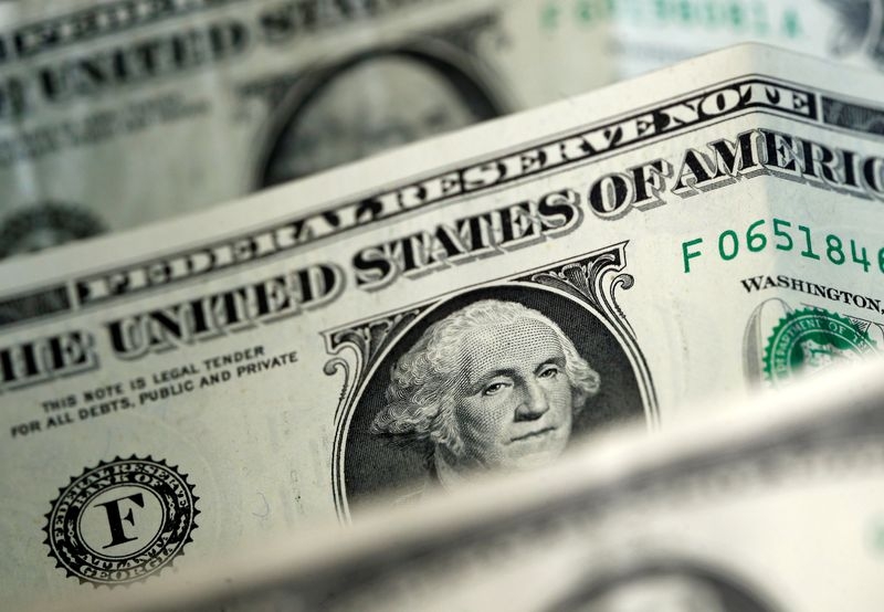 Dollar poised for fifth-straight monthly drop on trade, fiscal uncertainty