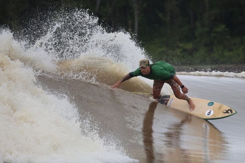 As the Amazon's waves weaken, a surfer fights to protect them
