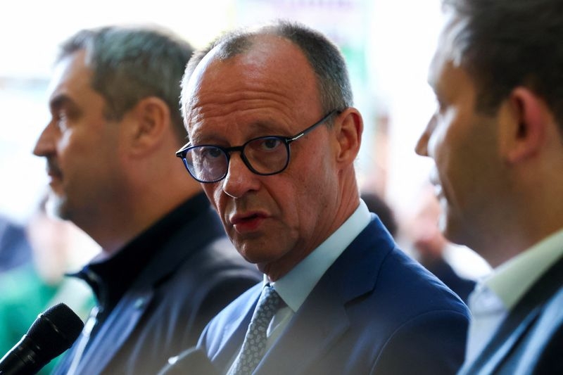 Battered by polls, tariffs and allies, Germany's Merz seeks to regain agenda
