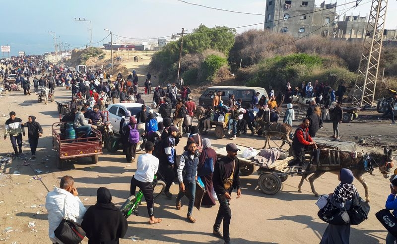 Palestinians return to Gaza City as mediators look ahead to next stage