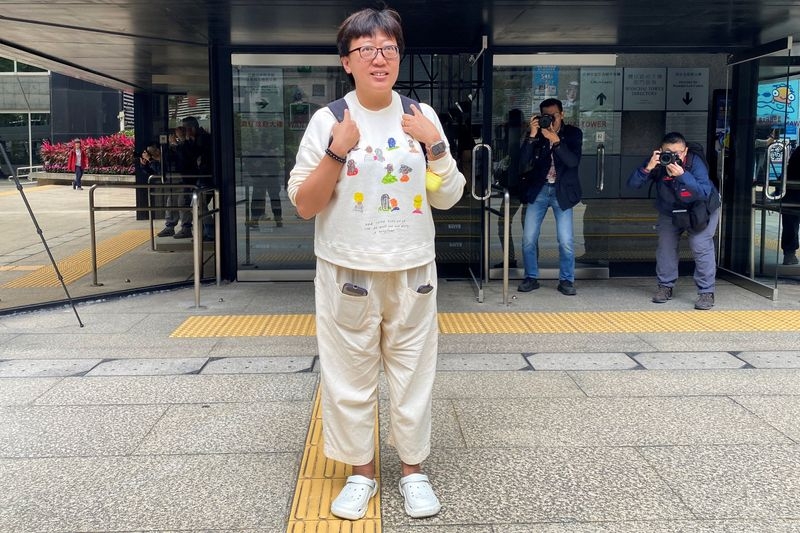 After retrial, Hong Kong court jails social worker to nearly 4 years for rioting
