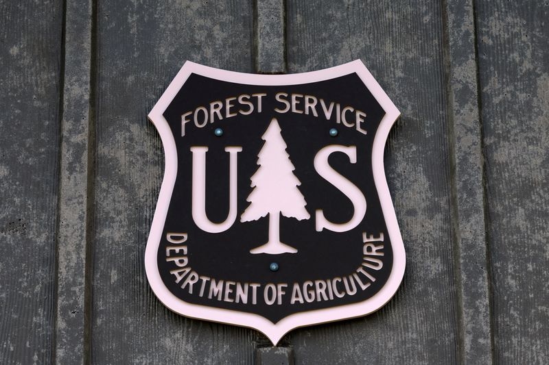 As US wildfires rage, firefighters clean toilets after Trump staff cuts, critics say