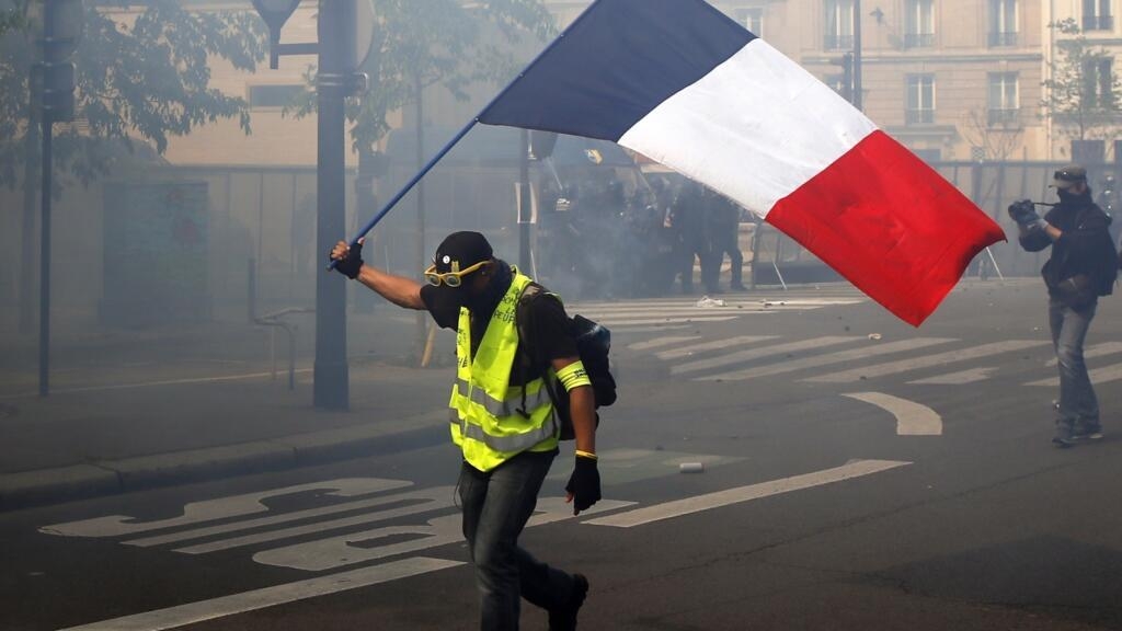 Protests, picnics and politics as France marks fraught May Day