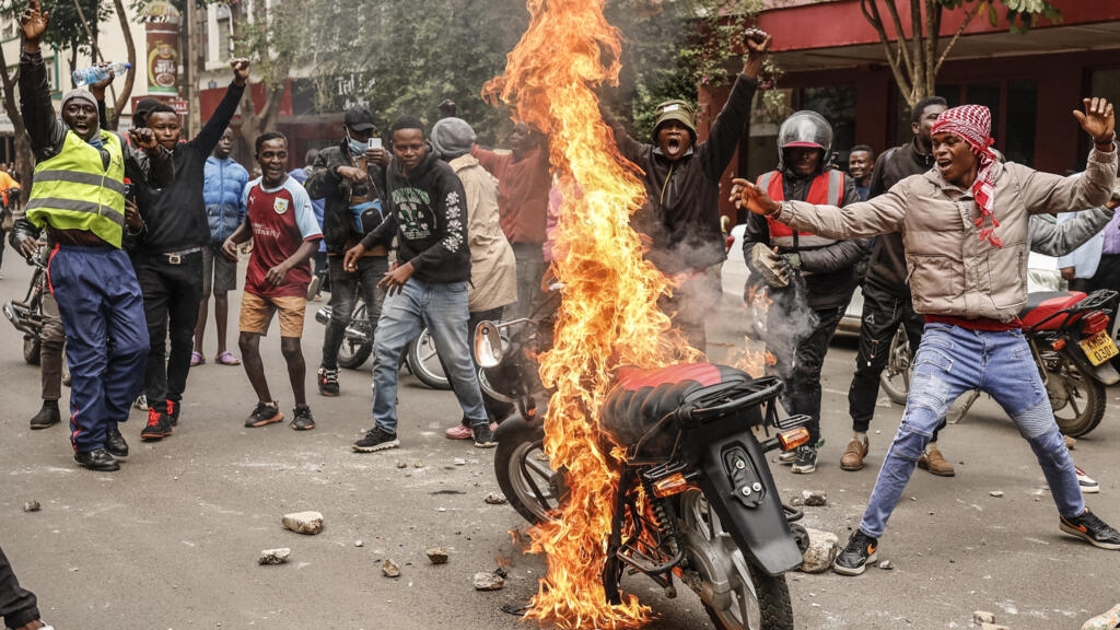 Violence erupts in Kenya as 'goons' attack protesters over death in police custody