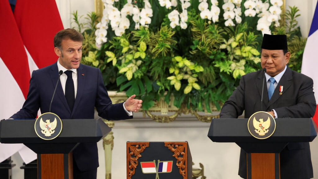 Macron courts Jakarta, offers Indonesia 'third way' in regional power play
