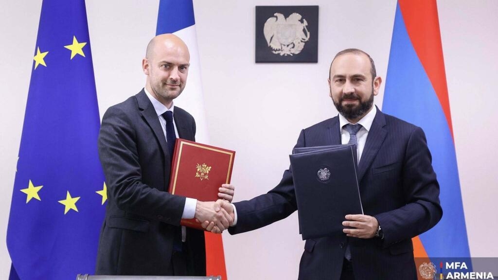 France pushes for peace in the Caucasus amid heat over Iran detainees