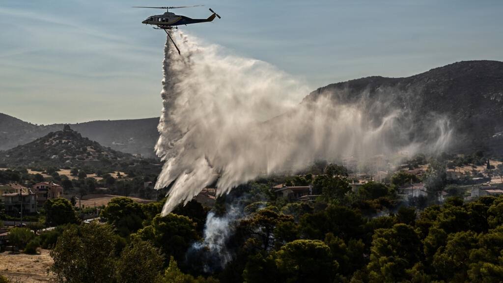 Firefighters battle blaze near Athens for second day