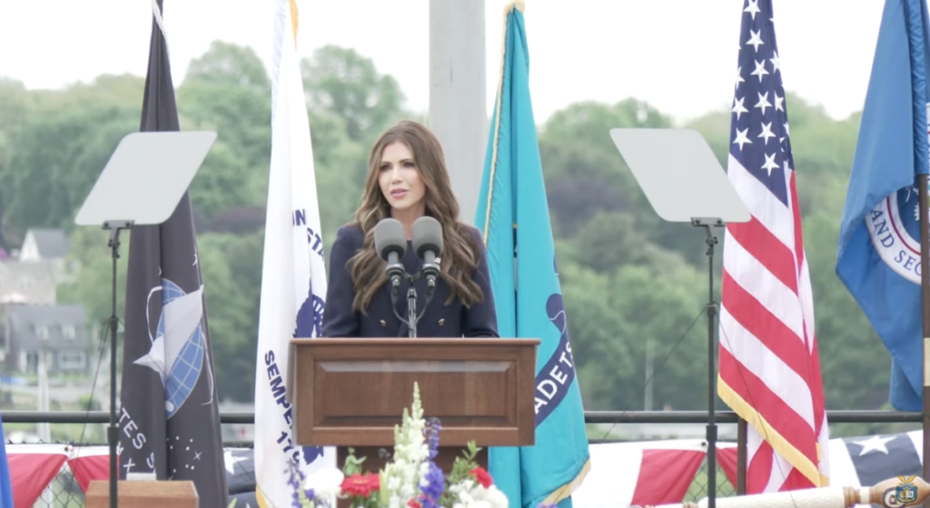 At Coast Guard Academy graduation, Kristi Noem talks as protesters gather