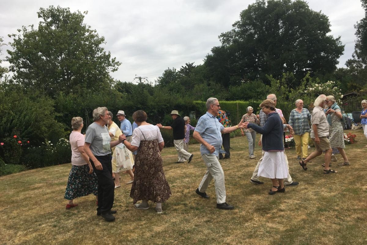 Folk dancers enjoy sunny afternoon of dancing and picnics