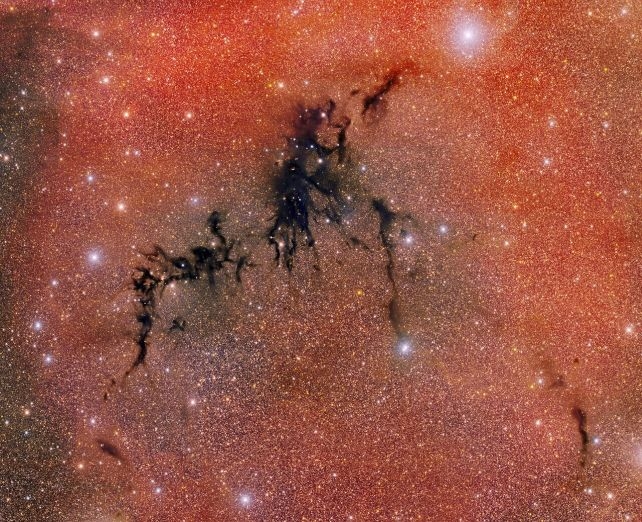 This Eerie Crack of Darkness in The Sky Is Hiding a Glittering Secret