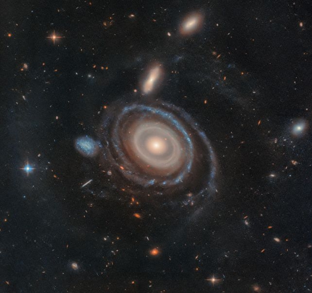 Hubble Reveals Cosmic Bullet That Gave The Bullseye Galaxy Its Record-Breaking Rings