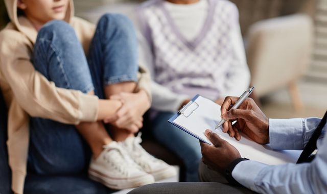 Government cuts therapy funding for adopted children