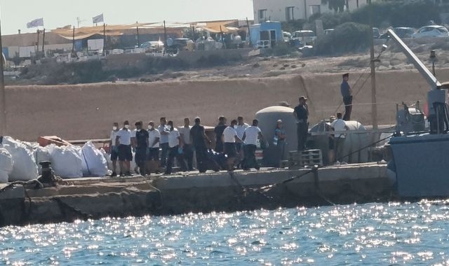 At least 26 dead and around a dozen missing after migrant boat capsizes off coast of Italian island