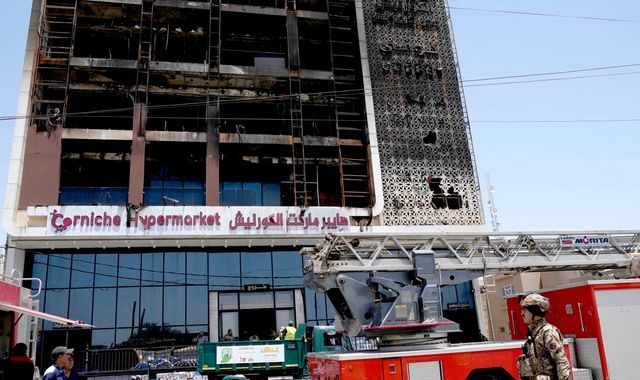 Sixty-one dead and others missing after shopping centre fire in eastern Iraq city of Kut