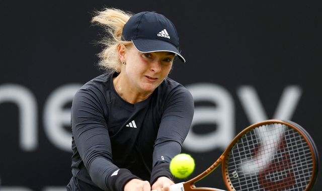 British tennis player Fran Jones helped off court after collapsing during match