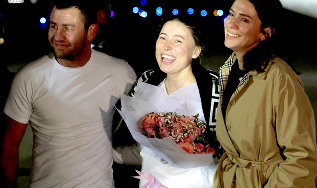 Ksenia Karelina: Hugs and smiles as ballerina jailed in Russia arrives home in US after prisoner exchange