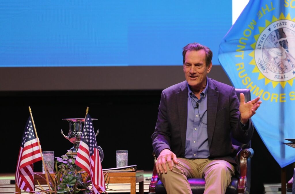 Governor signs bills cutting and adding to education-related funding