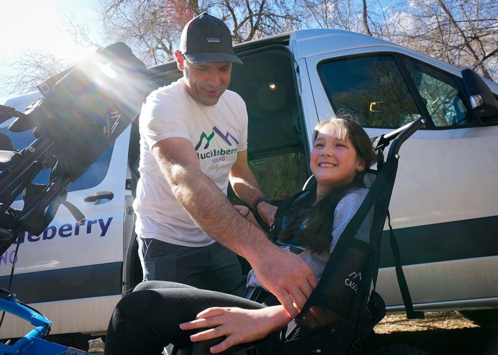 Doctors told a dad his daughter would never walk on her own. He built a way to get her on the trails.