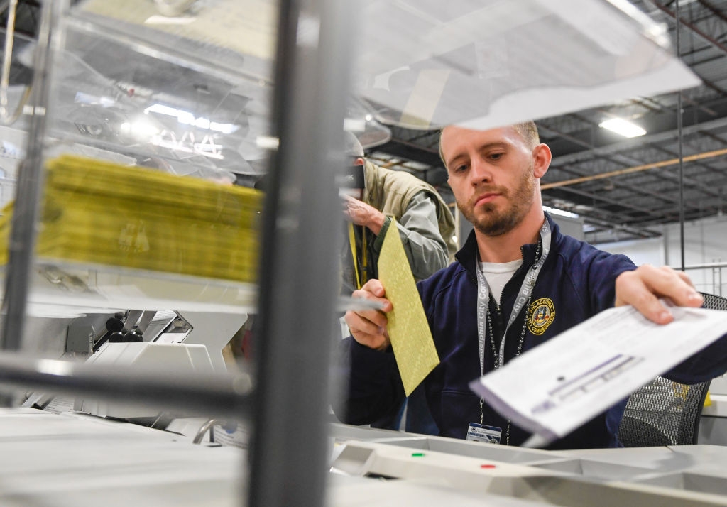 Election officials blast Trump's ‘retreat' from protecting voting against foreign threats
