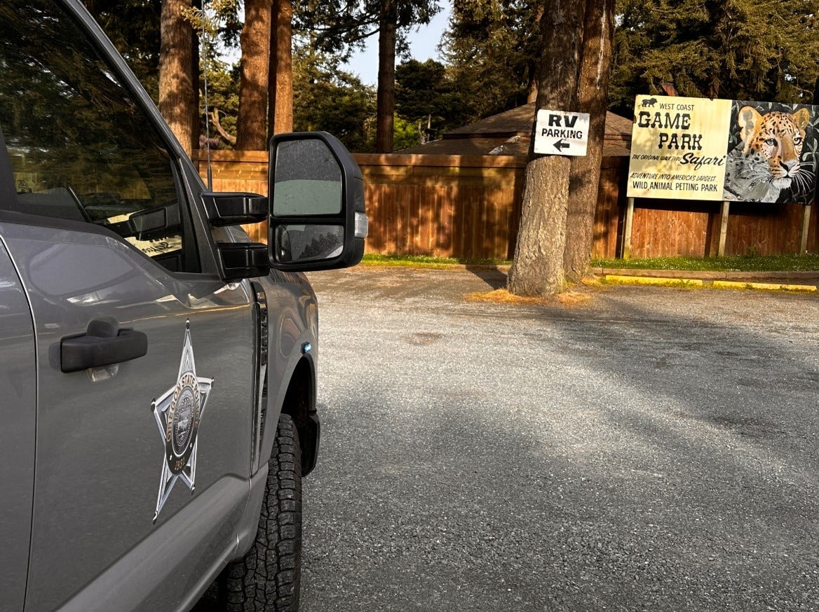 Oregon Coast safari park owner arrested after 44 guns, $1.6M cash, drugs found, police say