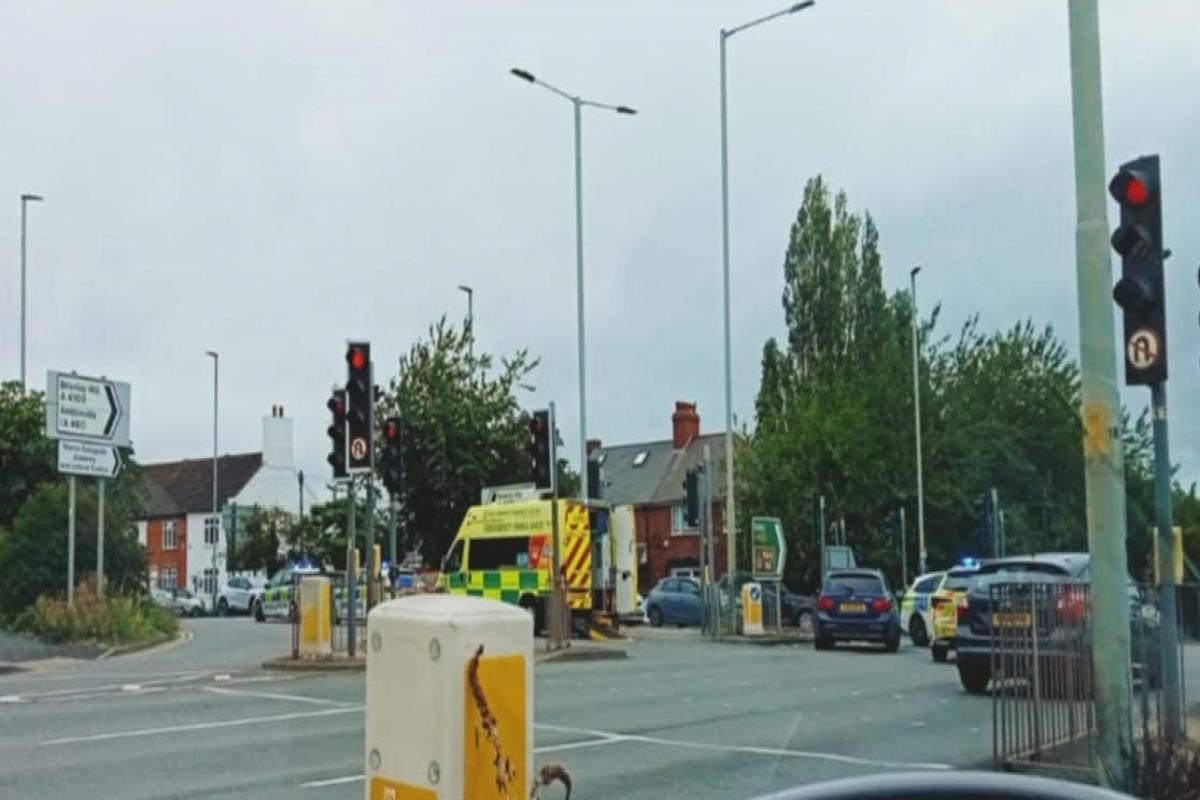 Appeal after vehicle crashes with police car on blue lights
