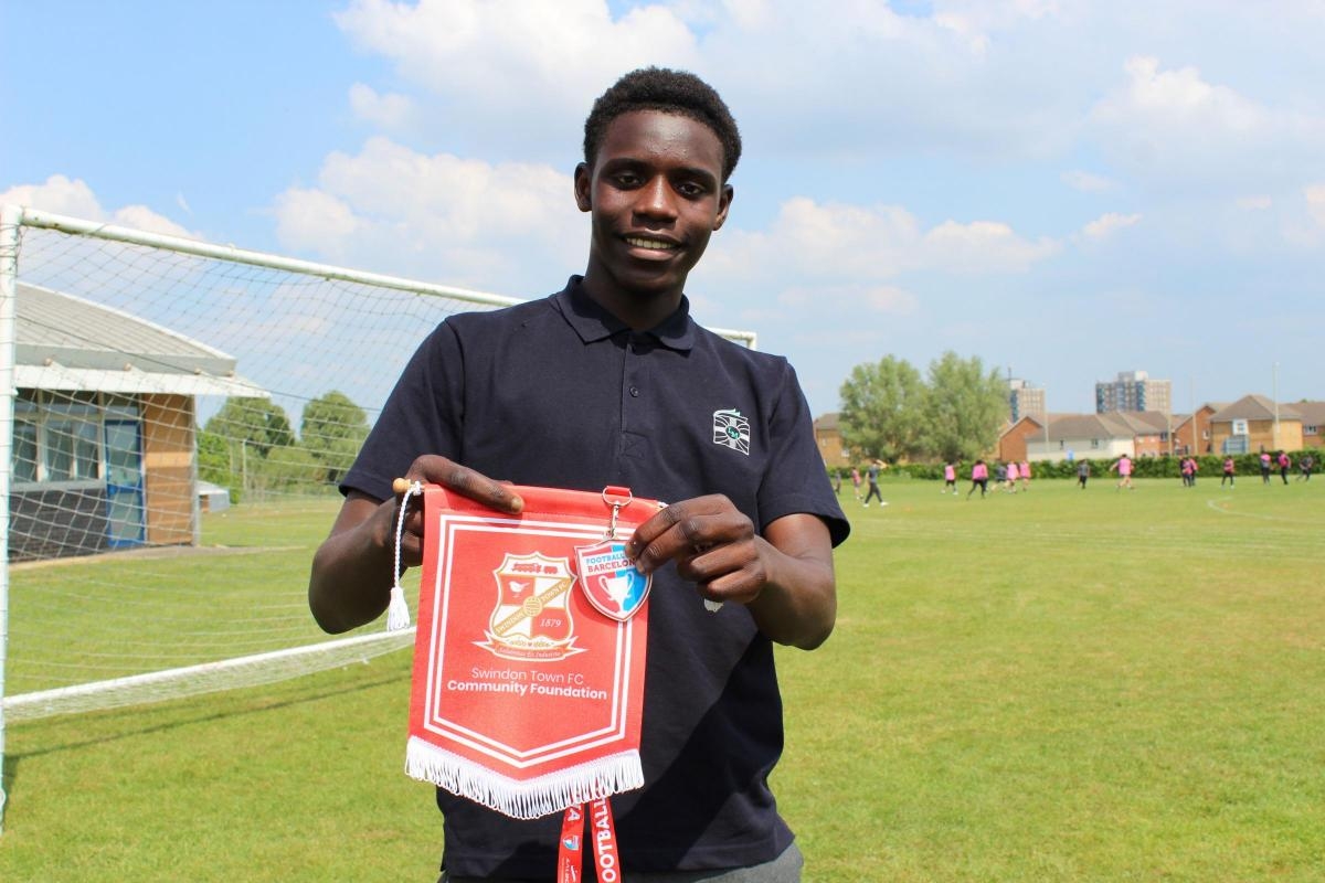 Young striker signs to local football club's academy in record time