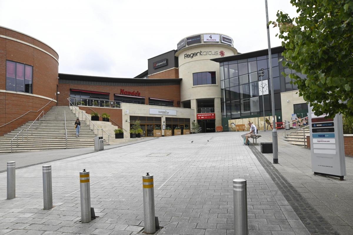Driver 'threatened and chased by bald man' in town centre incident