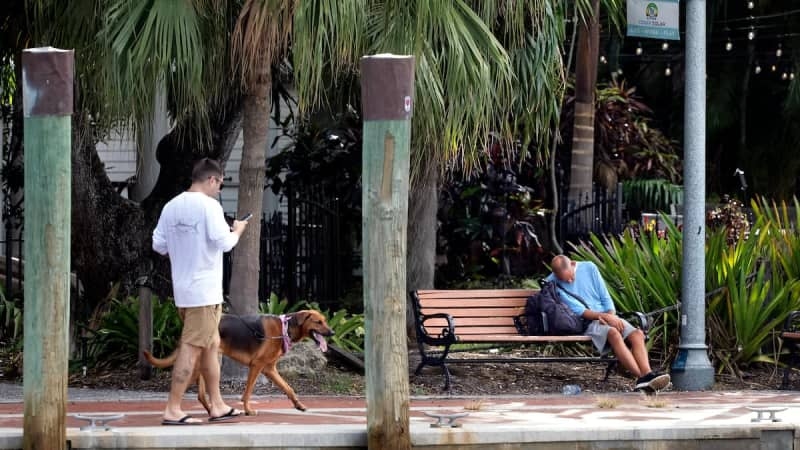 Florida city's Riverwalk still a homeless hot spot despite new anti-camping law, critics say