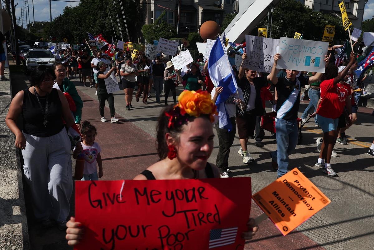Hundreds gather in Houston and San Antonio to protest immigration crackdowns in workplaces, courthouses