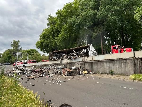 Truck overturns on OR-126 on-ramp in Eugene, dumping scrap metal and causing delays