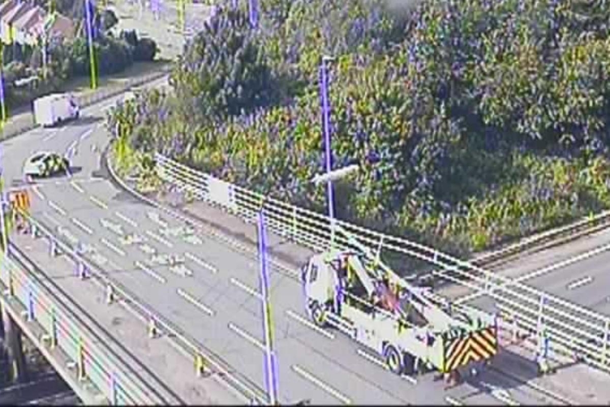 Picture shows damage to bridge's railing as police issue statement on M62 closure
