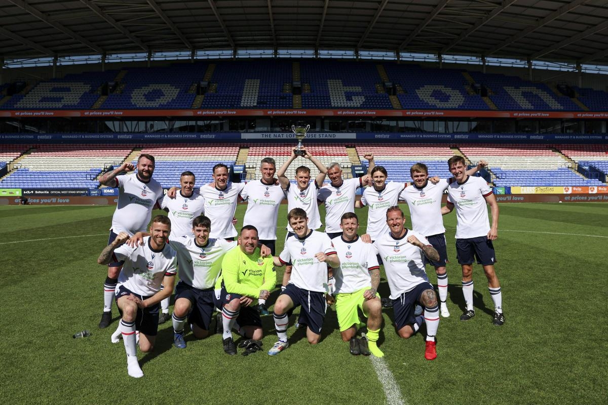 Teams from Bolton take to the pitch at Bolton Wanderers for the annual special match