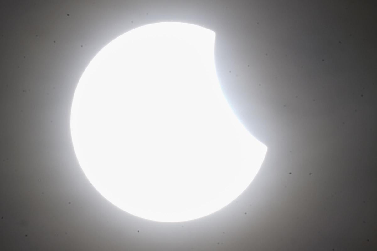 Skygazers see partial solar eclipse visible in skies above Bolton