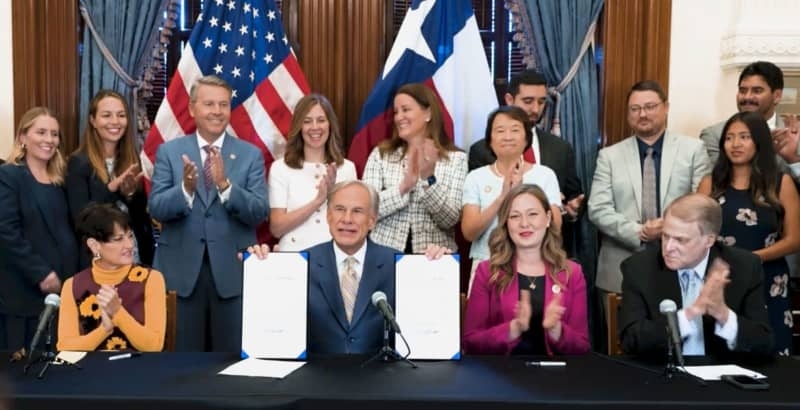 Abbott signs bills to improve childcare, early learning programs