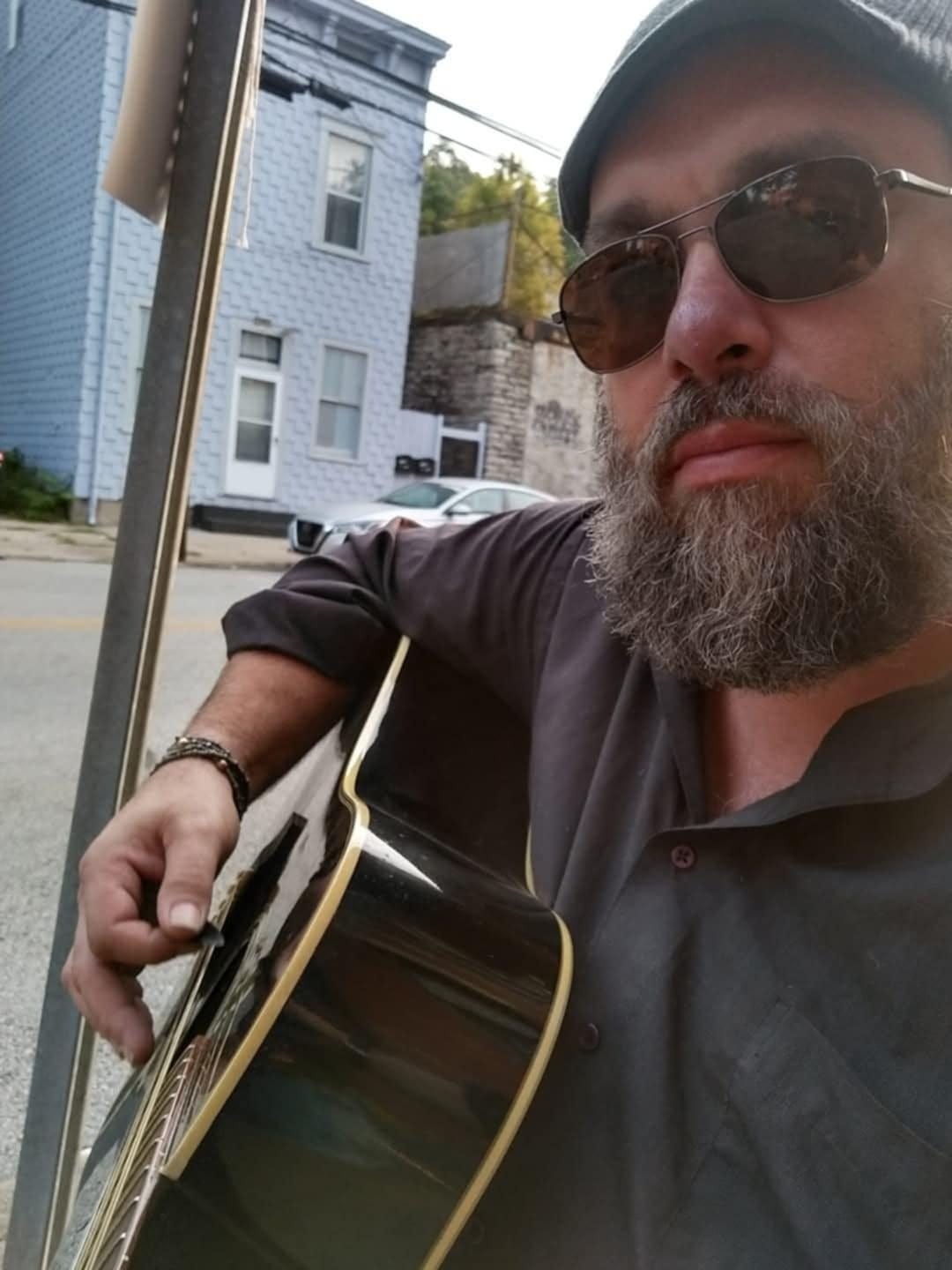 Prosecutors: Musician was trying to call for help when he was killed in the West End