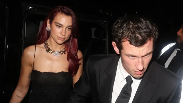Dua Lipa & Callum Turner Serve Serious Glam in Paris Photos