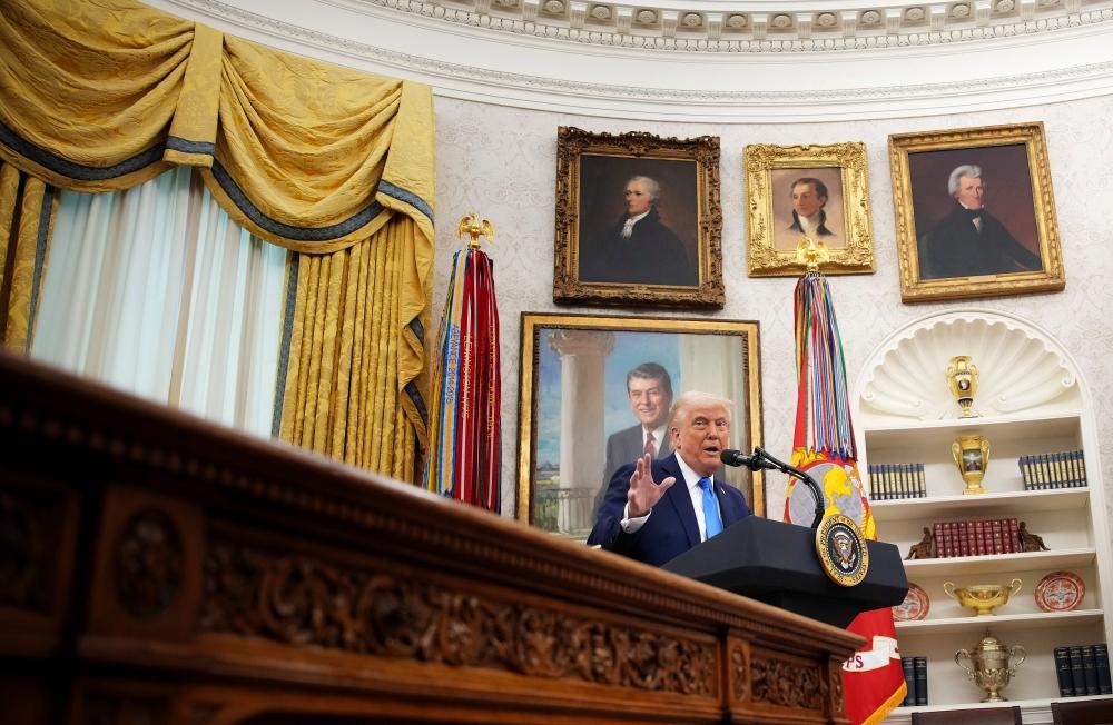 More than 80 ex-staffers of top law firm express ‘deep outrage' over Trump deal
