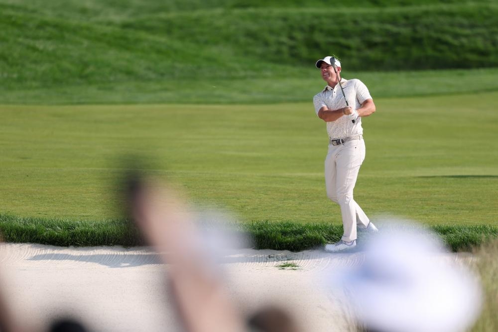 Rory McIlroy stumbles in US Open first round as JJ Spaun strides into lead