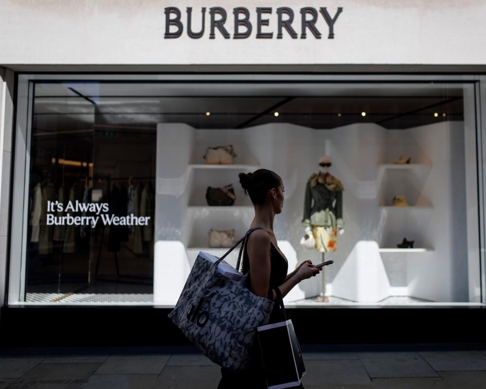 Burberry pays new boss almost £2.6m in nine months while axing jobs