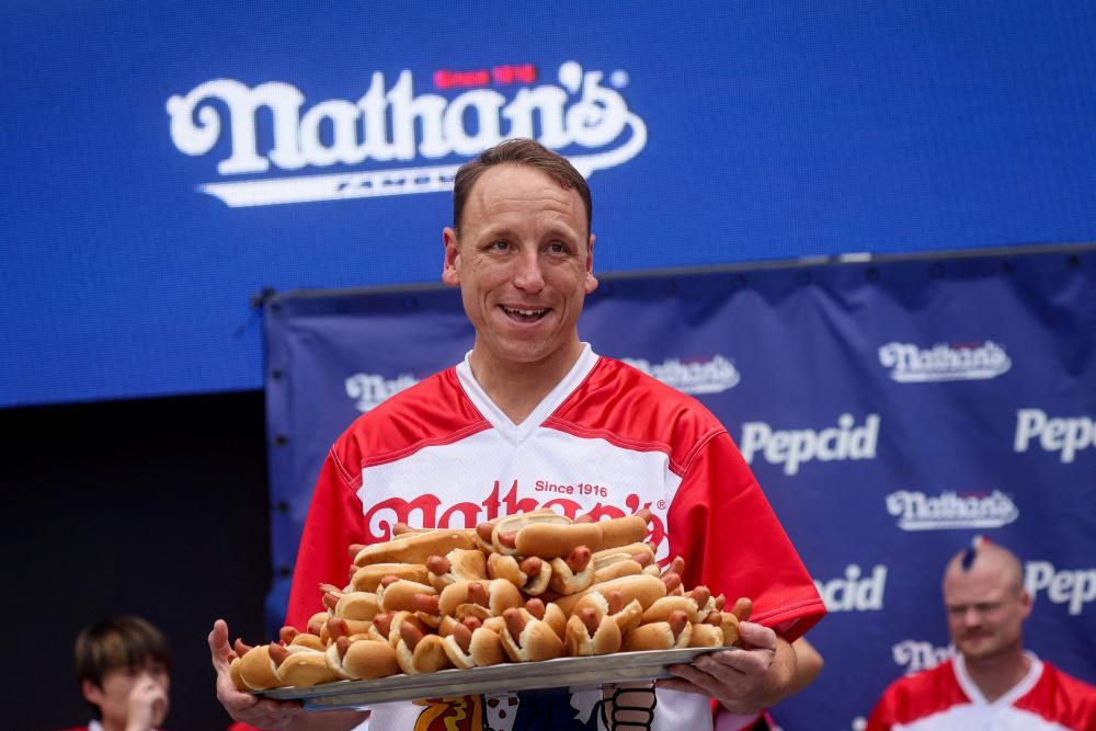 One swallower to make Coney Island's summer as hotdog champion returns