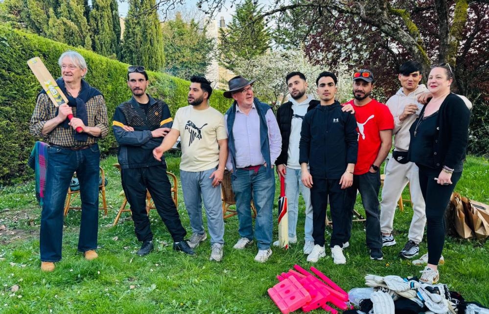 Chipboard and carpet: refugee cricket tournament brings a moment of happiness