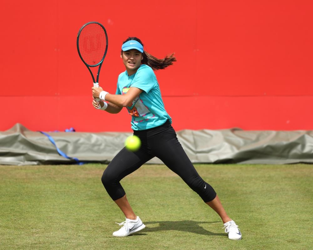 Raducanu says ‘expectations are low' for Queen's Club after fresh back spasm