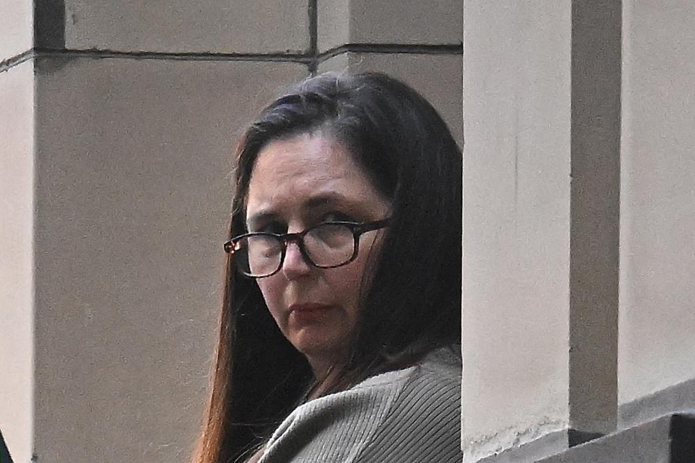 Protester accosts judge as Erin Patterson trial hears how officials tried to find source of deadly mushrooms