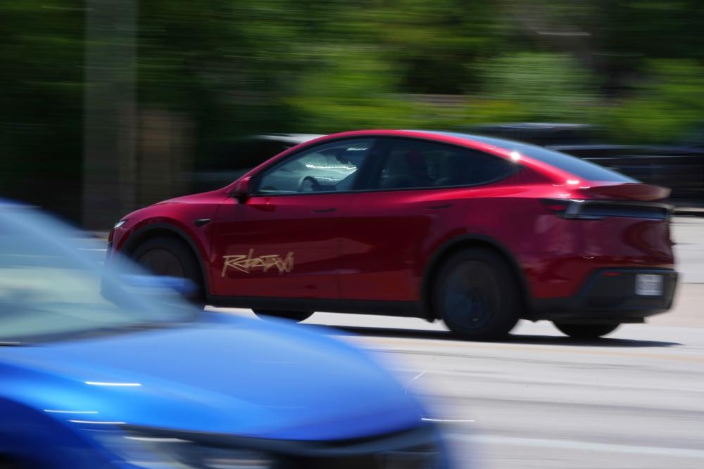 US investigates Tesla's Robotaxi launch after videos show erratically driving cars
