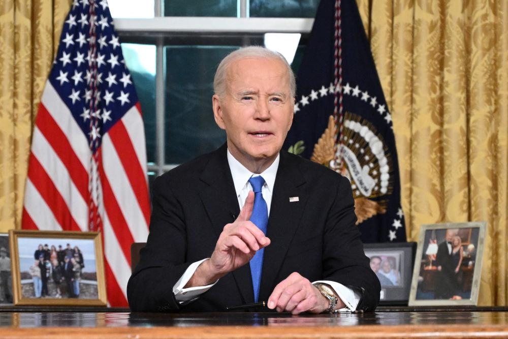 Go-to author on White House reverses take on Biden and slams former president